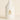 White bottle of Vesper Chaga mushroom extract on a beige background